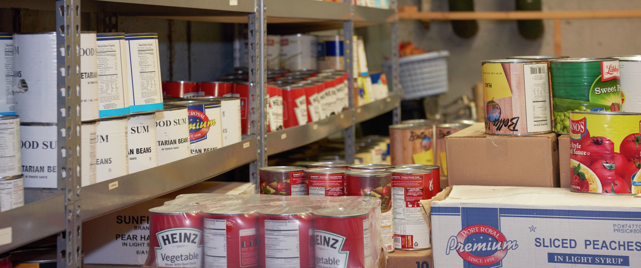 Canned goods and other packaged foods in a commercial pantry