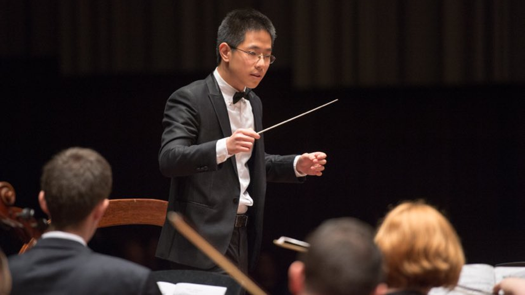 Dan Zhang conducting the first Penn Medicine Symphony Orchestra concert in 2016.