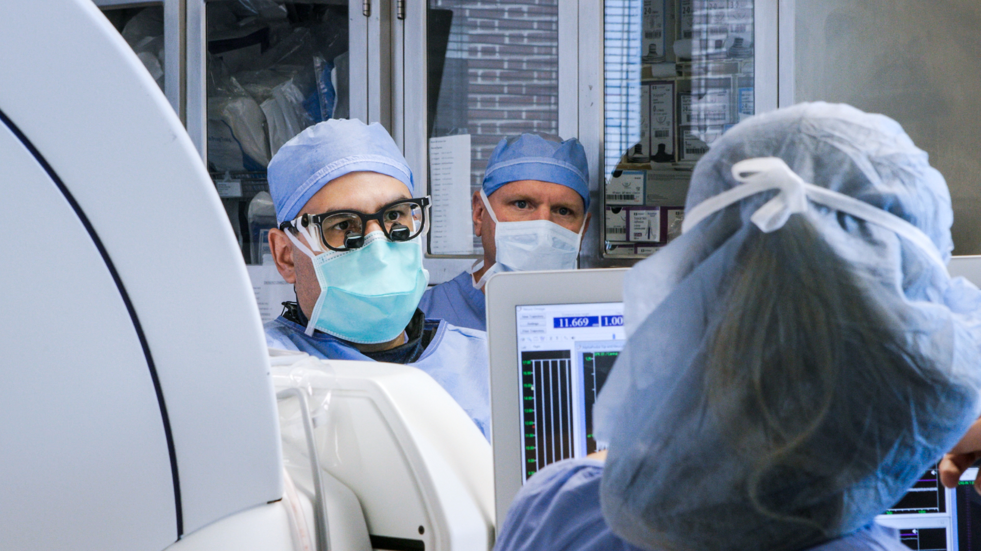 Iahn Cajigas, MD, PhD; Medtronic representative Paul Sherlock; and eletrophysiologist Melanie Donley, PhD