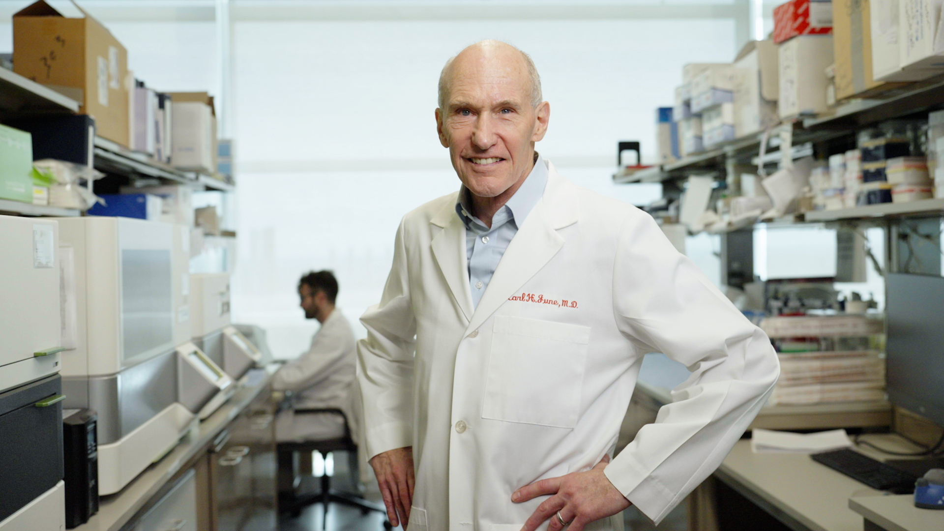 Carl June MD standing in lab