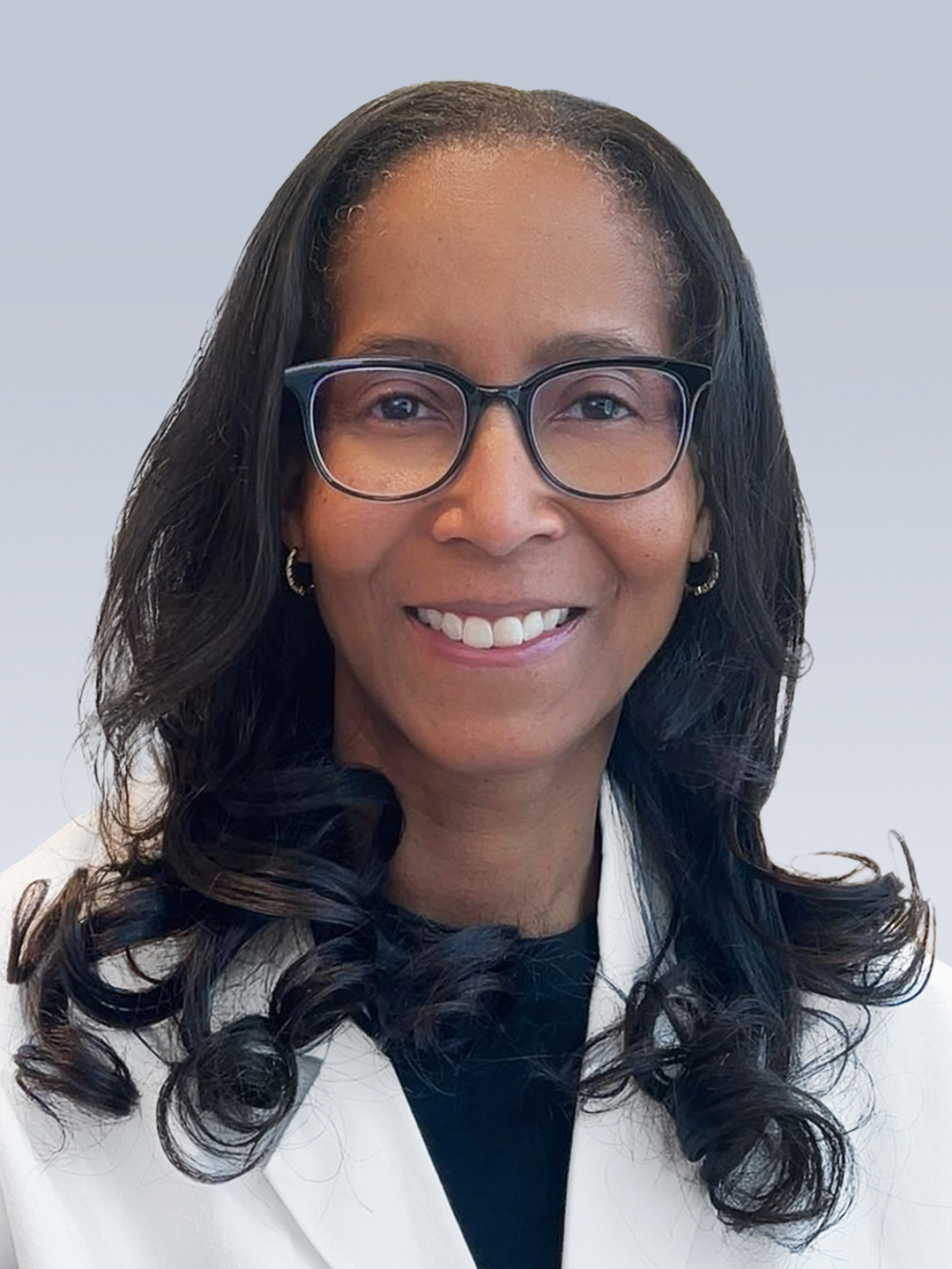 Headshot of Raina Merchant, MD