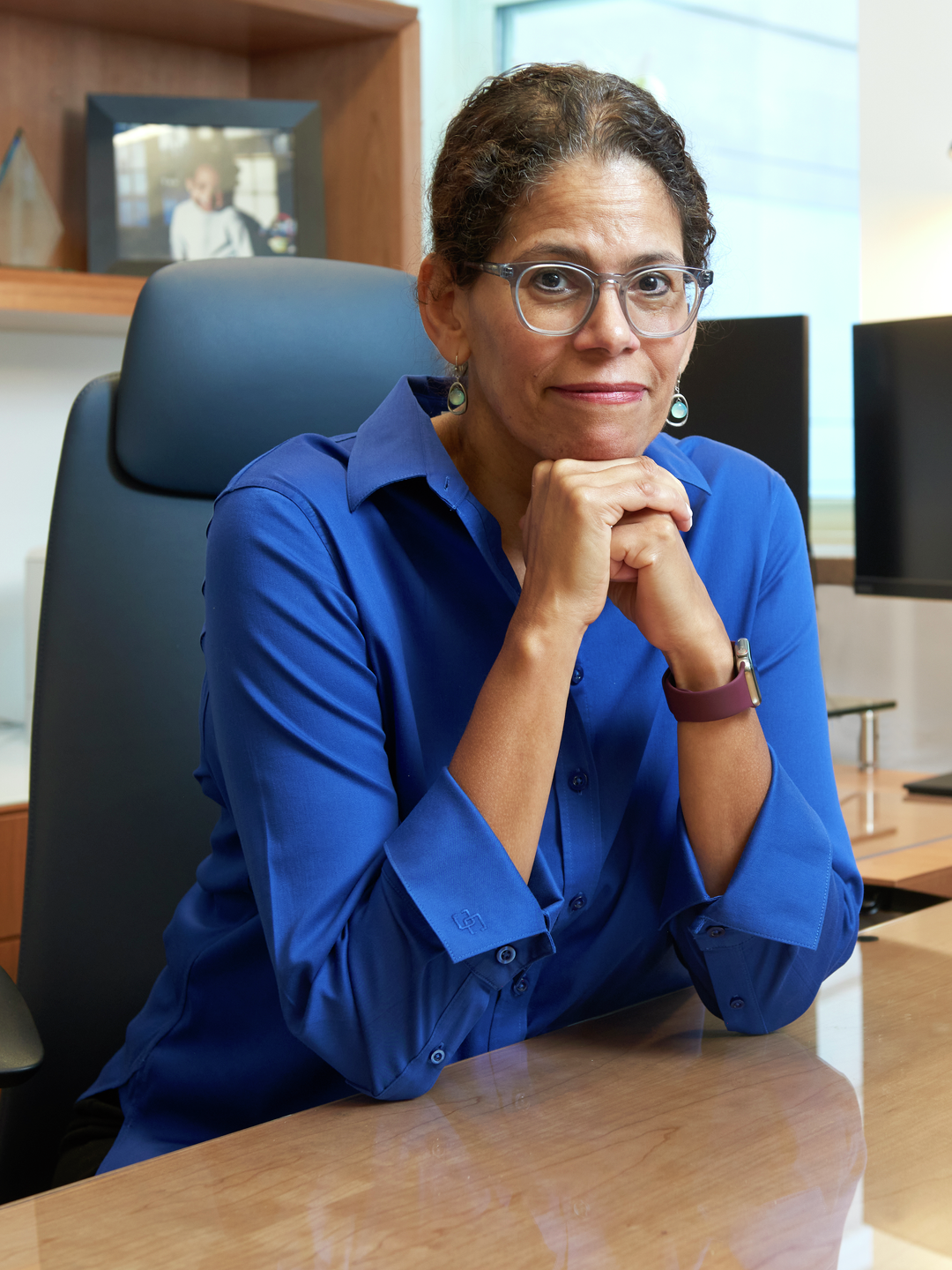 Elizabeth Howell, MD, MPP, seated at her desk