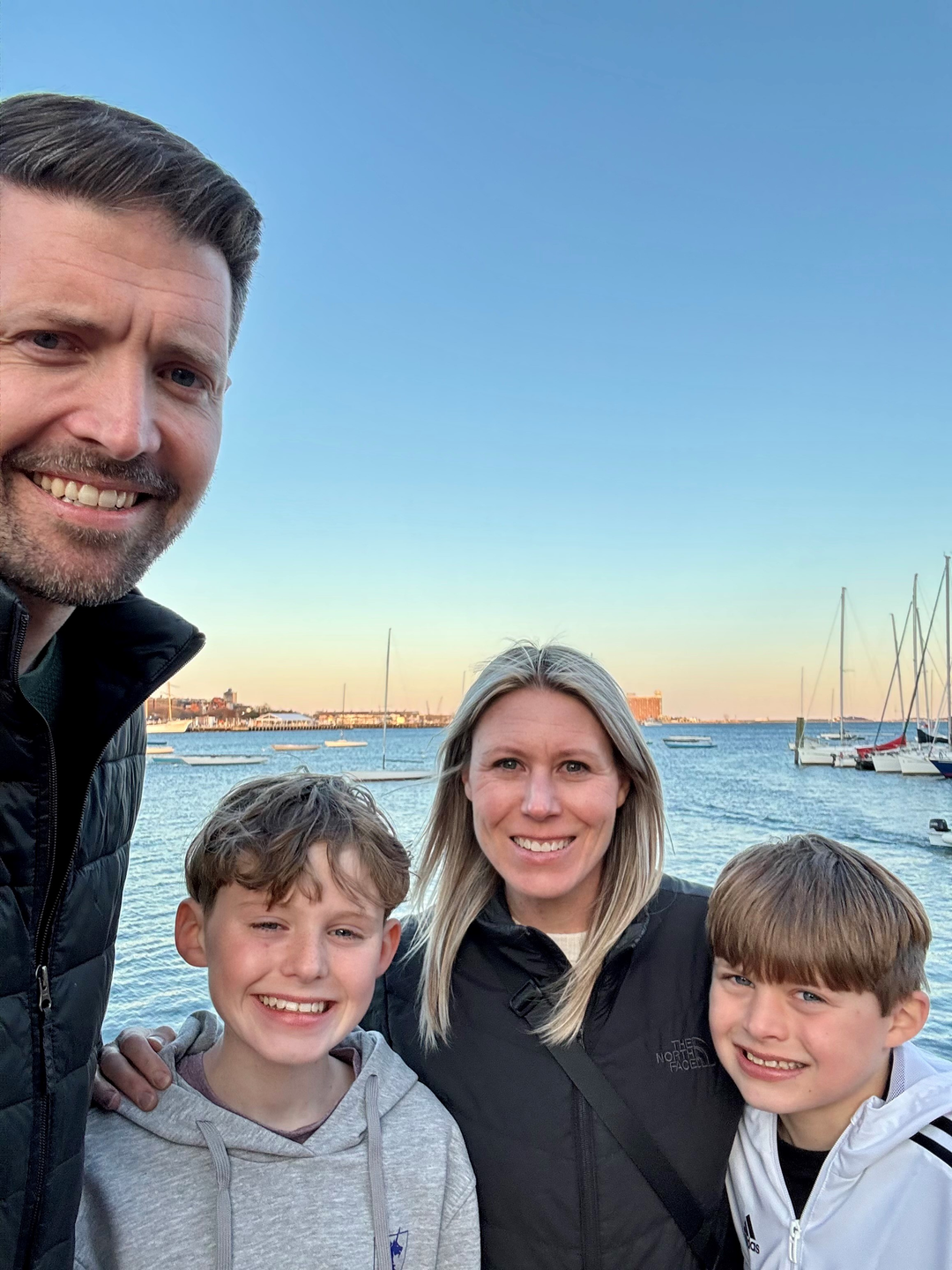 Jen Brady with her husband and two boys