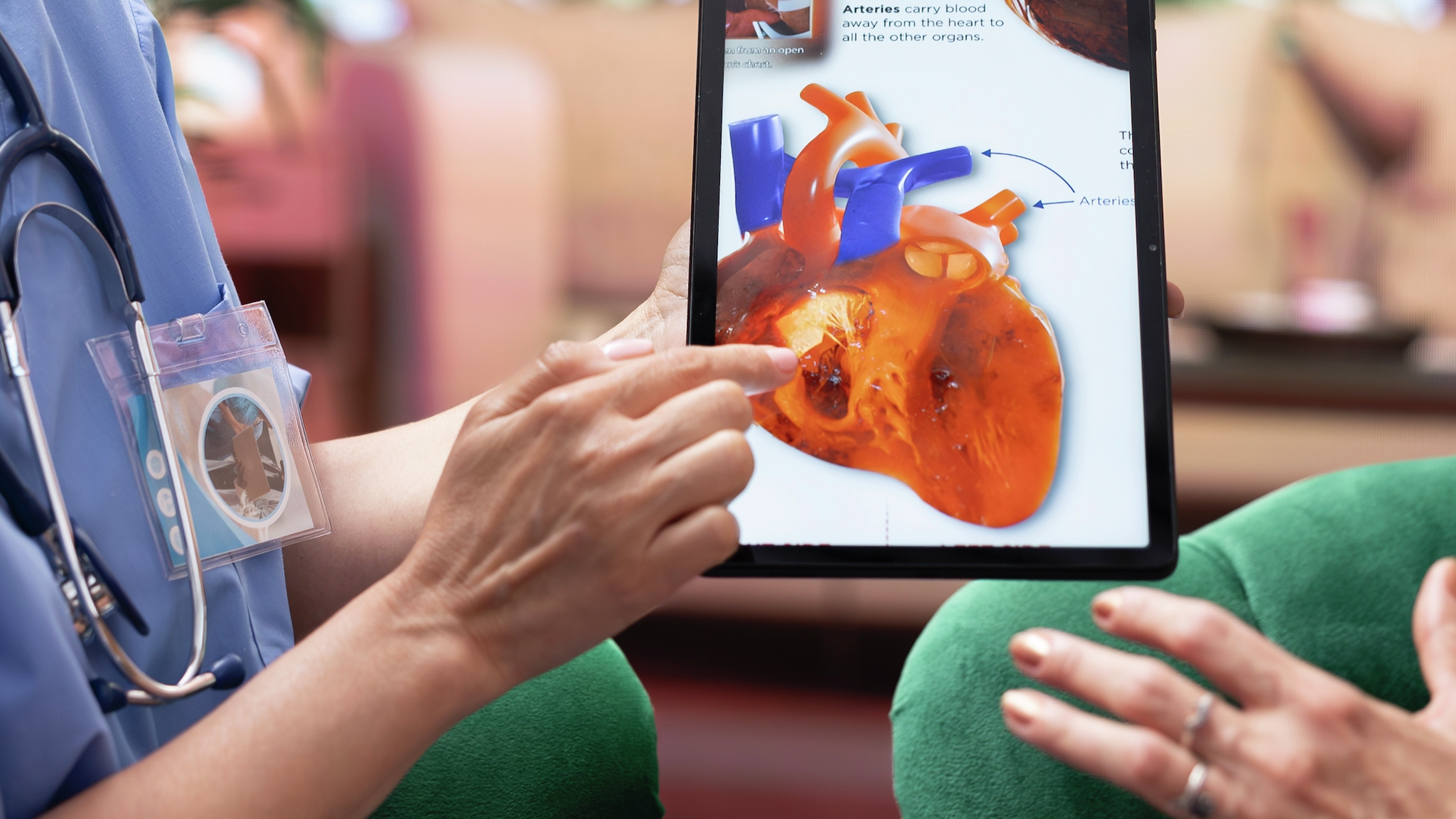 nurse explaining a heart condition or disease to elderly patients cardiovascular system illustration