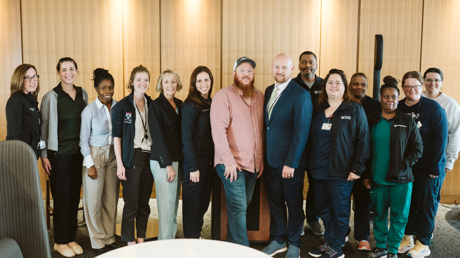 Jeff Dillard, center, with members of his HUP care team