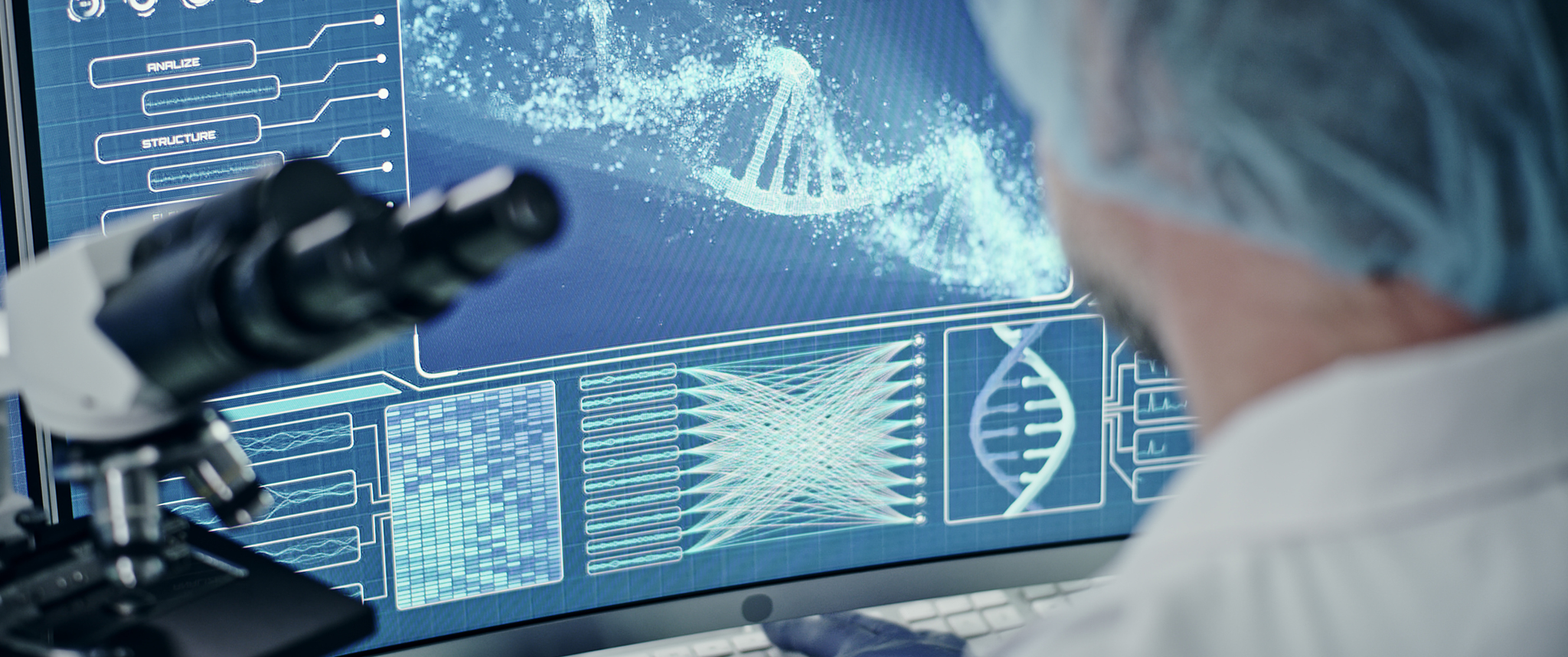 Computer screens in laboratory. DNA models and data