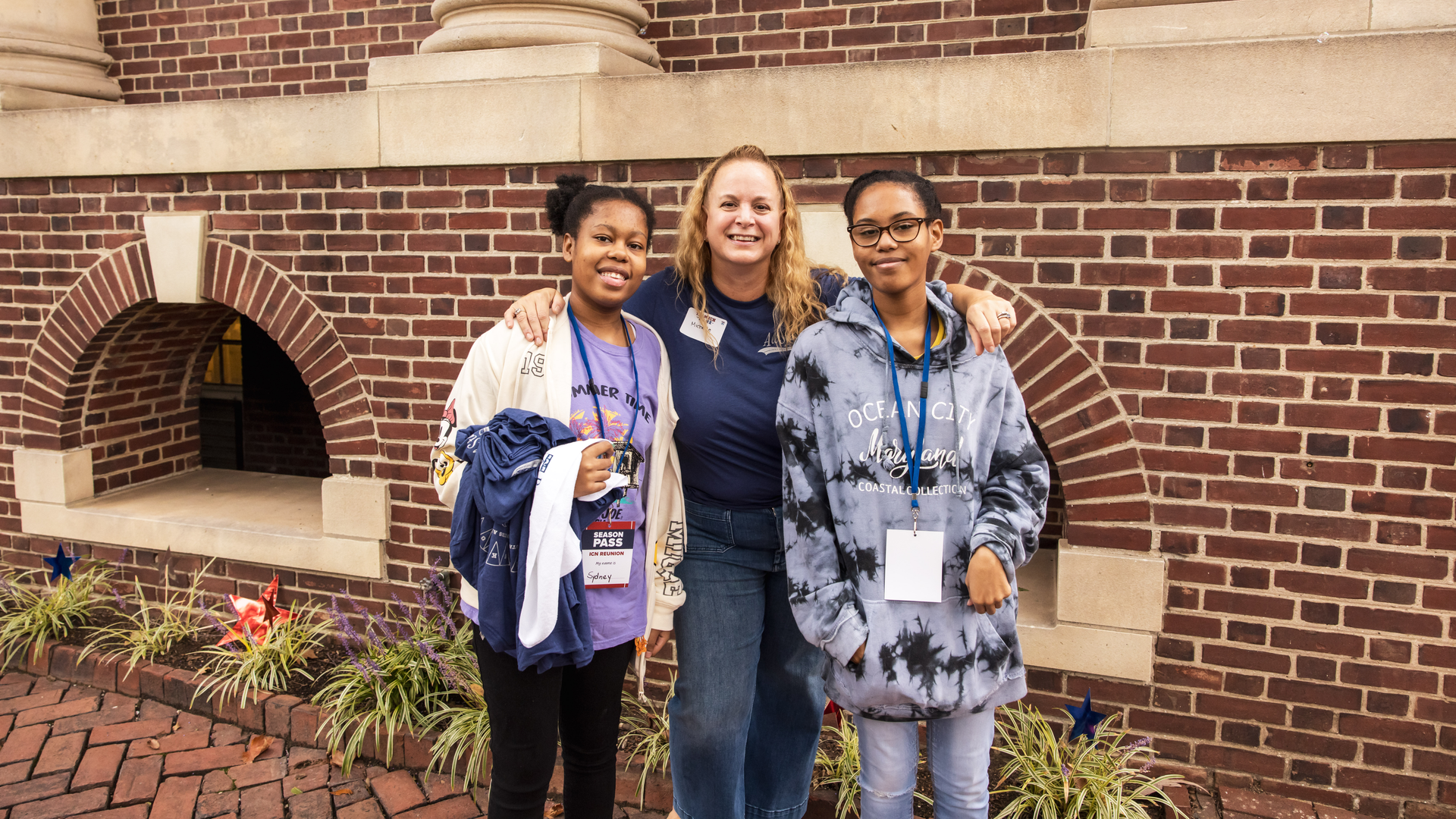 Michelle Sohlich-Miller, in center, with twins Sydney and Payton outside of Pennsylvania Hospital.