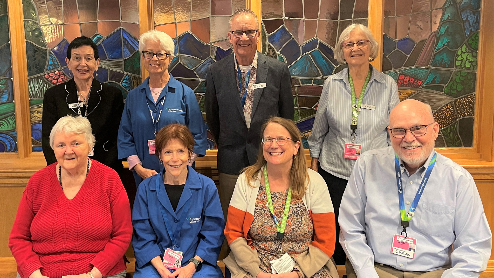 Rev. Maggie Ainslie in a group photo with volunteers in the Doylestown Hospital chapel
