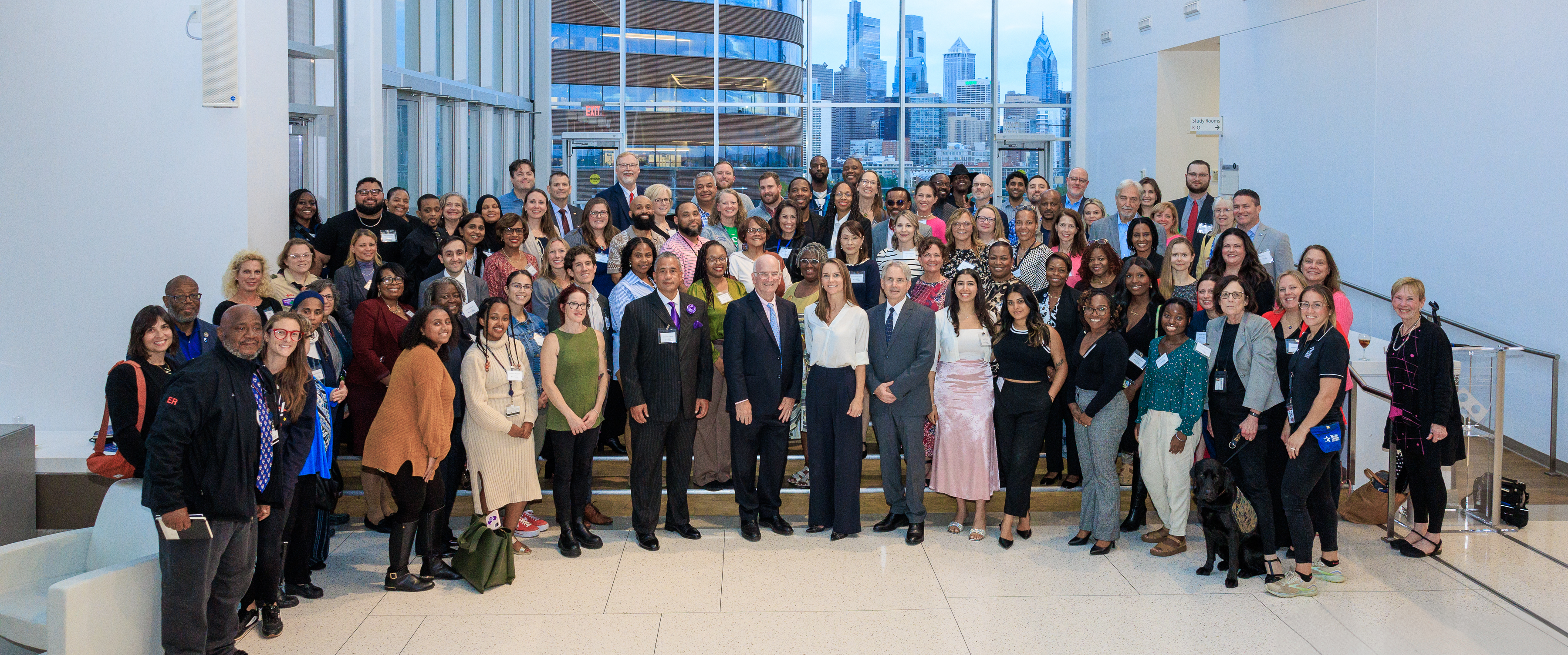 Group photo of Penn Medicine leaders with dozens of CAREs grant recipients and their community partners