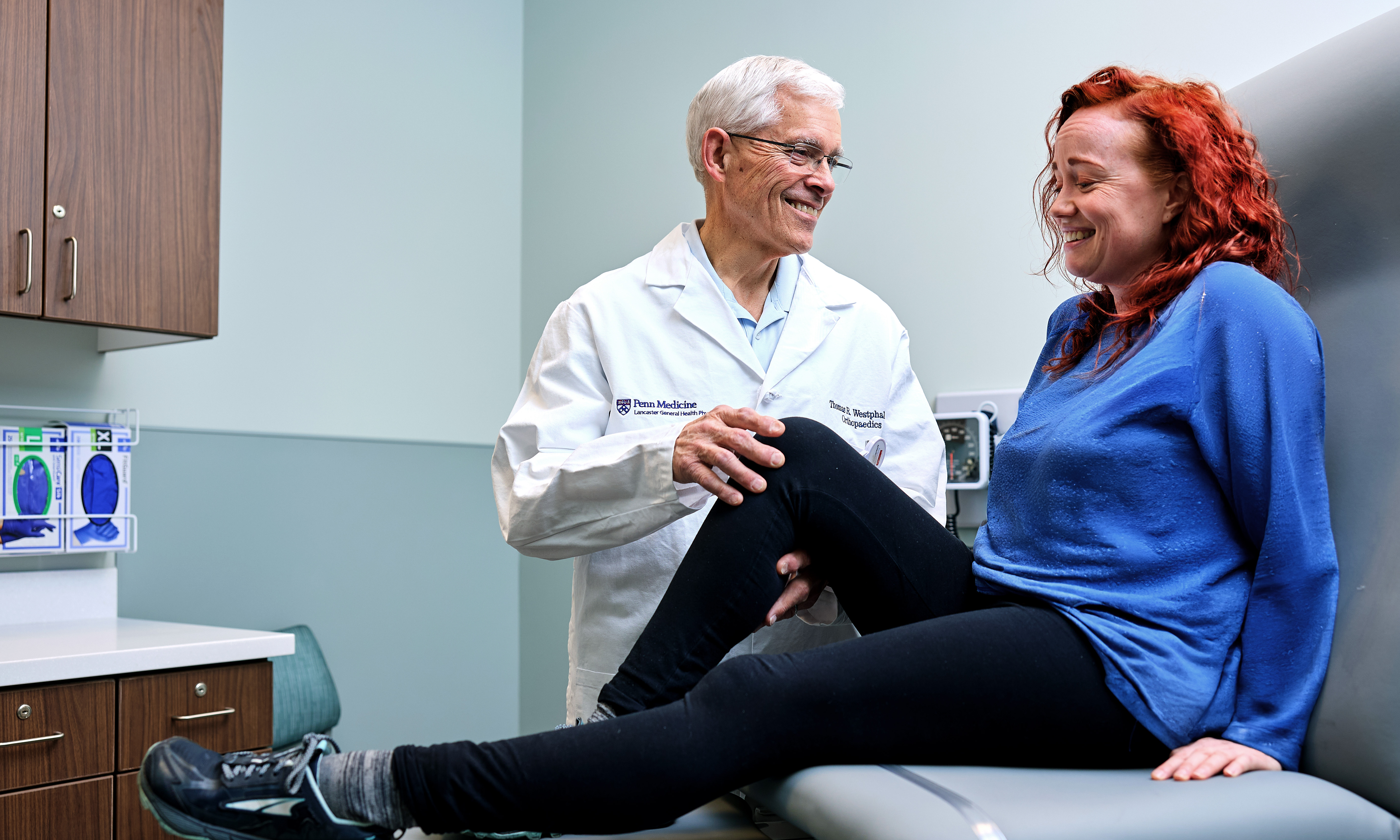 Dr. Thomas Westphal examines patient's knee at Penn Medicine Orthopaedics in Lancaster