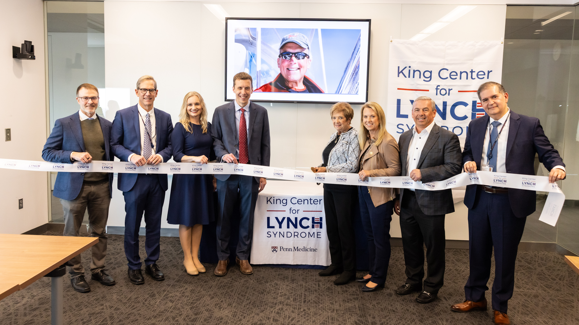 A ribbon-cutting ceremony of the King Center for Lynch Syndrome, attended by the center’s leadership team and members of the King and Borrelli families