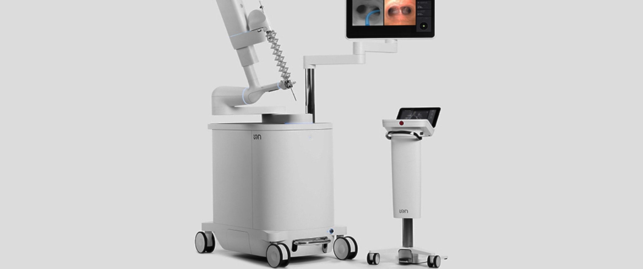 The Ion bronchoscopy system console, catheter, and imaging screen are shown