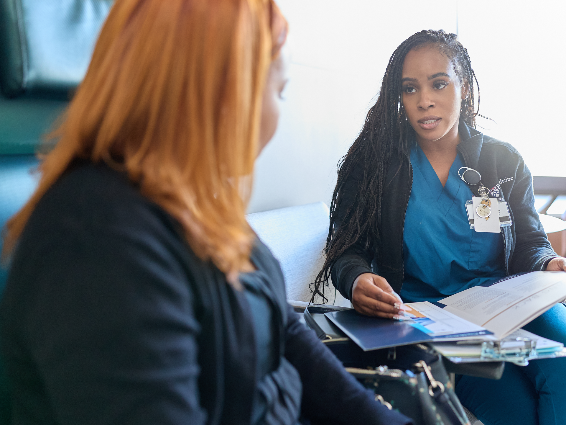 Penn Medicine nurse discussing cerebrovascular treatments with a patient