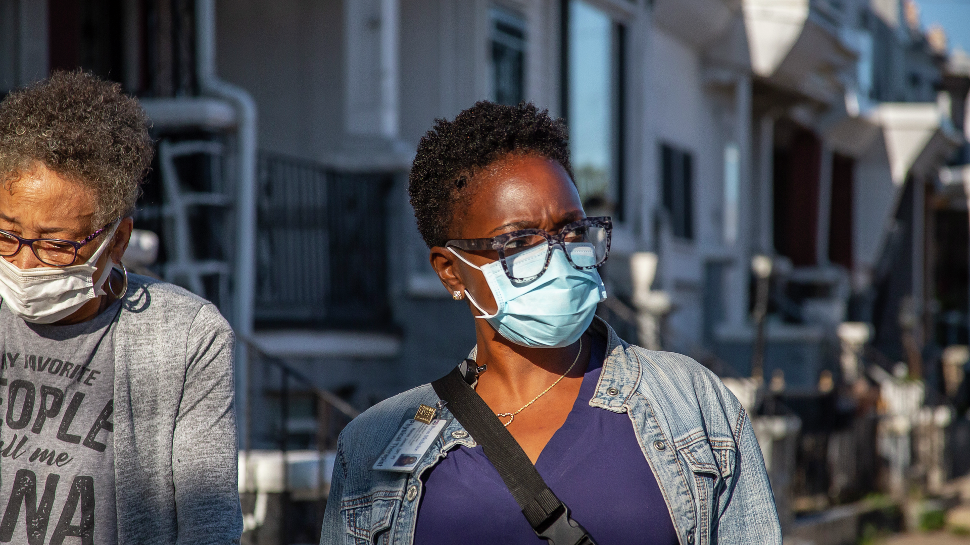 Renee Jones walks outside in Philadelphia with patient Valerie Simon
