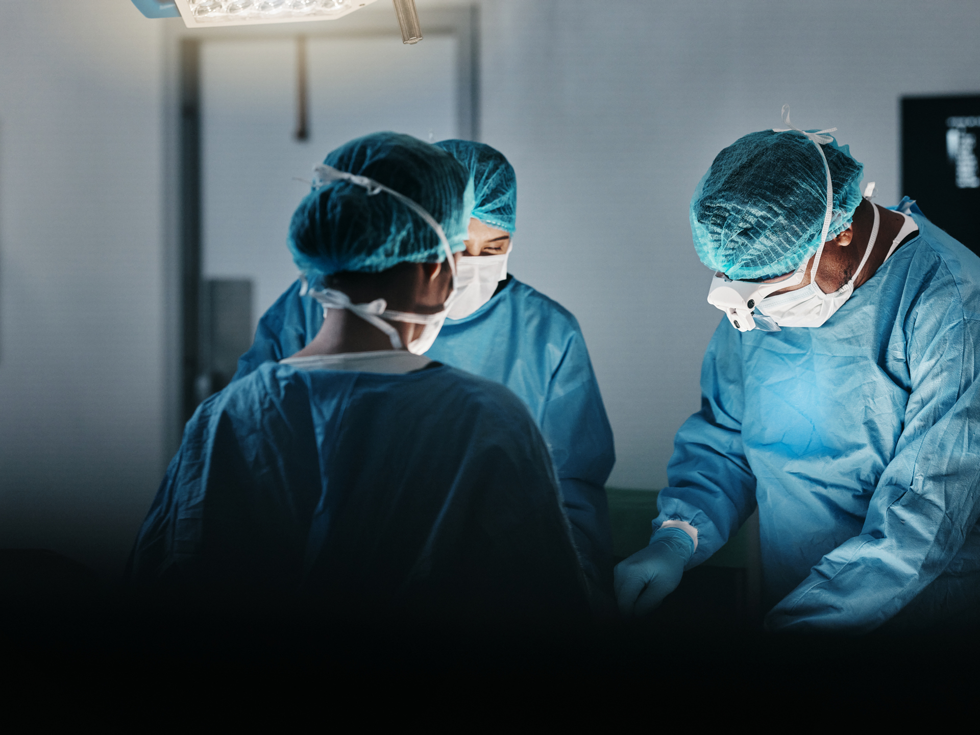 Surgeon team, people and operating room at hospital in scrubs