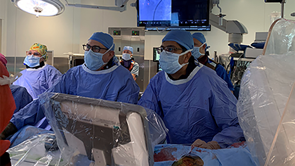 Drs. Darren Scheneider and Nimesh Desai performing percutaneous total aortic arch repair at Penn Medicine