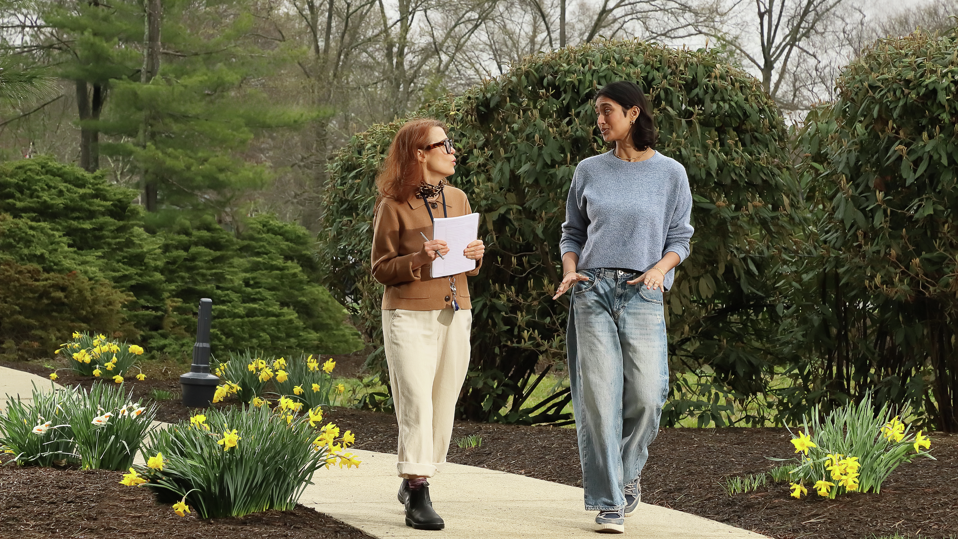 Patient and therapist walking in a park settings