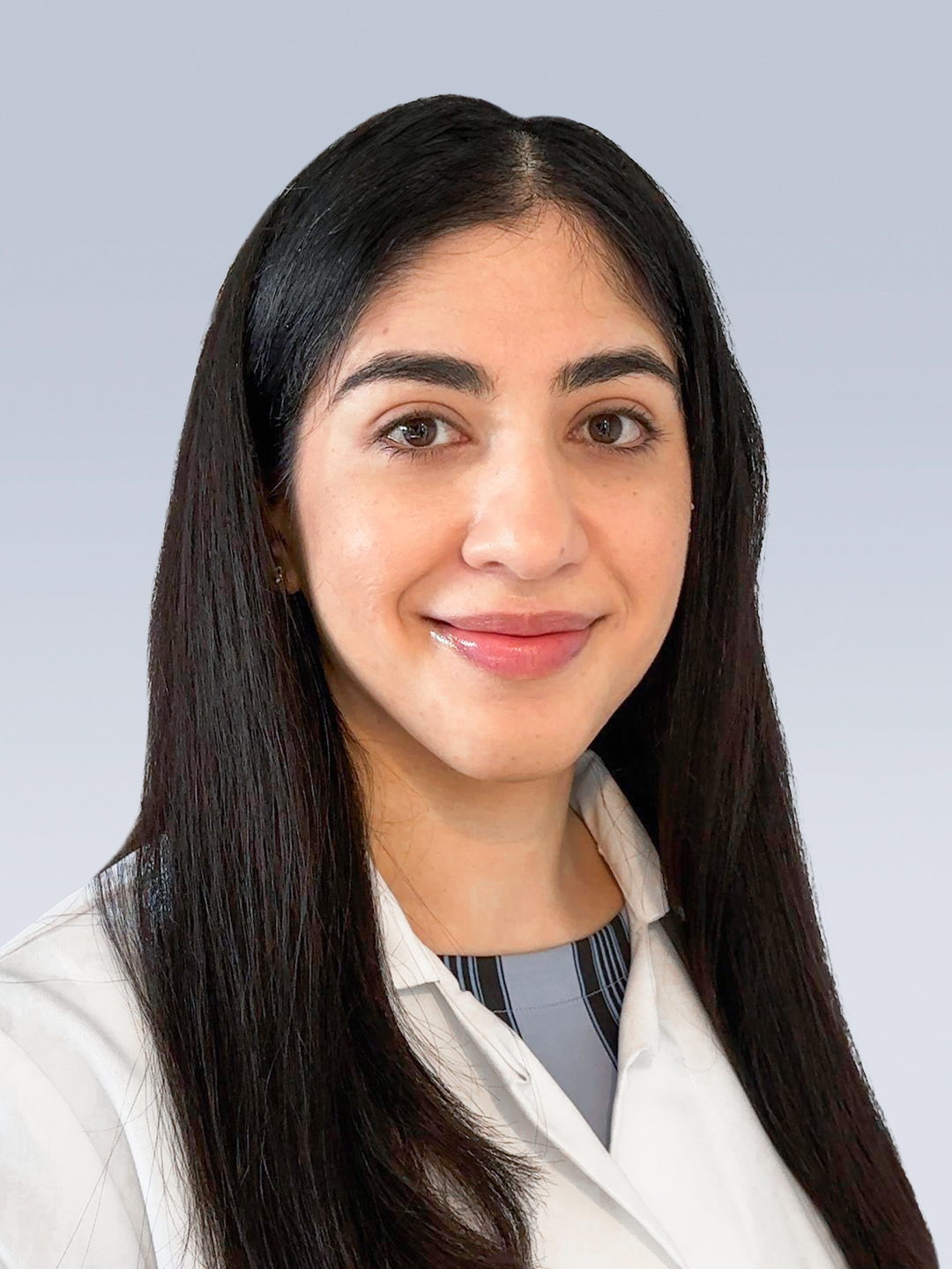 Headshot of Raashi Mamtani, MD