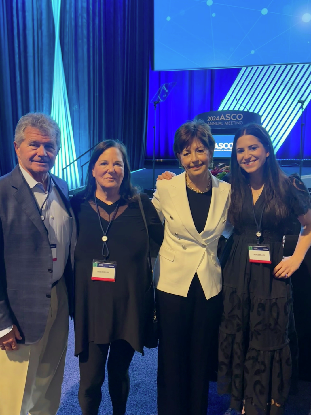 A group photo of Lynn Schuchter with Tara Miller's sister and parents at ASCO