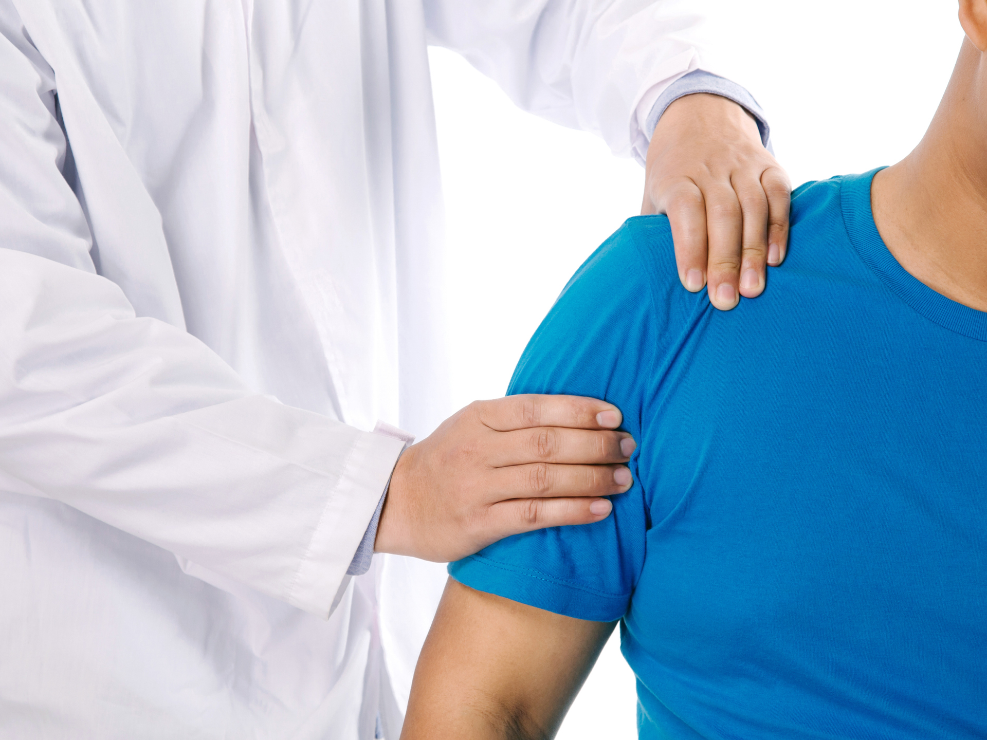 Doctor physiotherapist diagnosing patient with painful shoulder