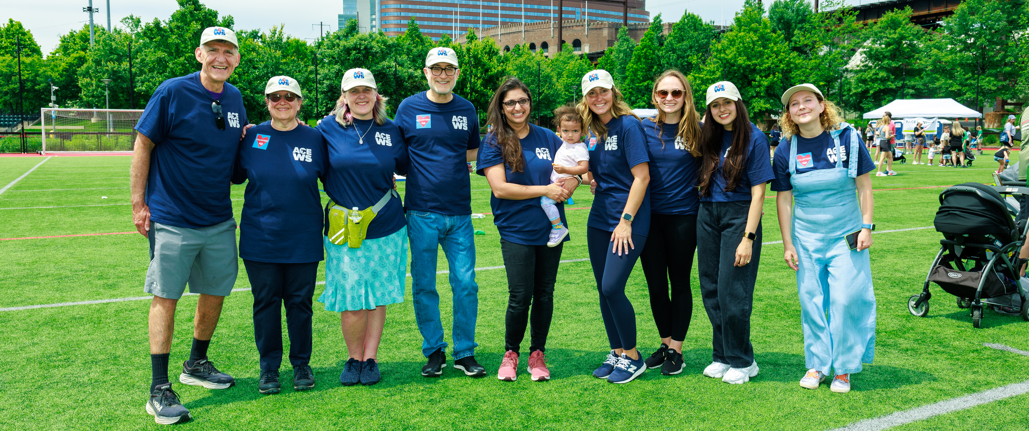 Daniel Rader with a group of Armellino Center for Excellence staff in Penn Park