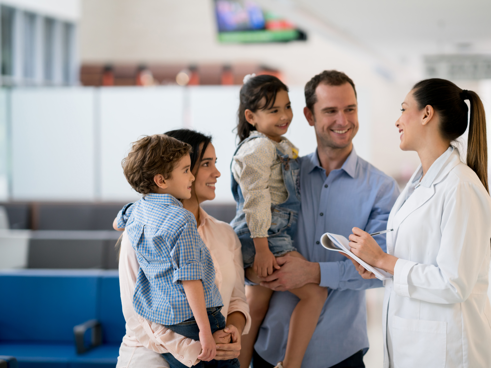 Doctor talking to a family at the hospital
