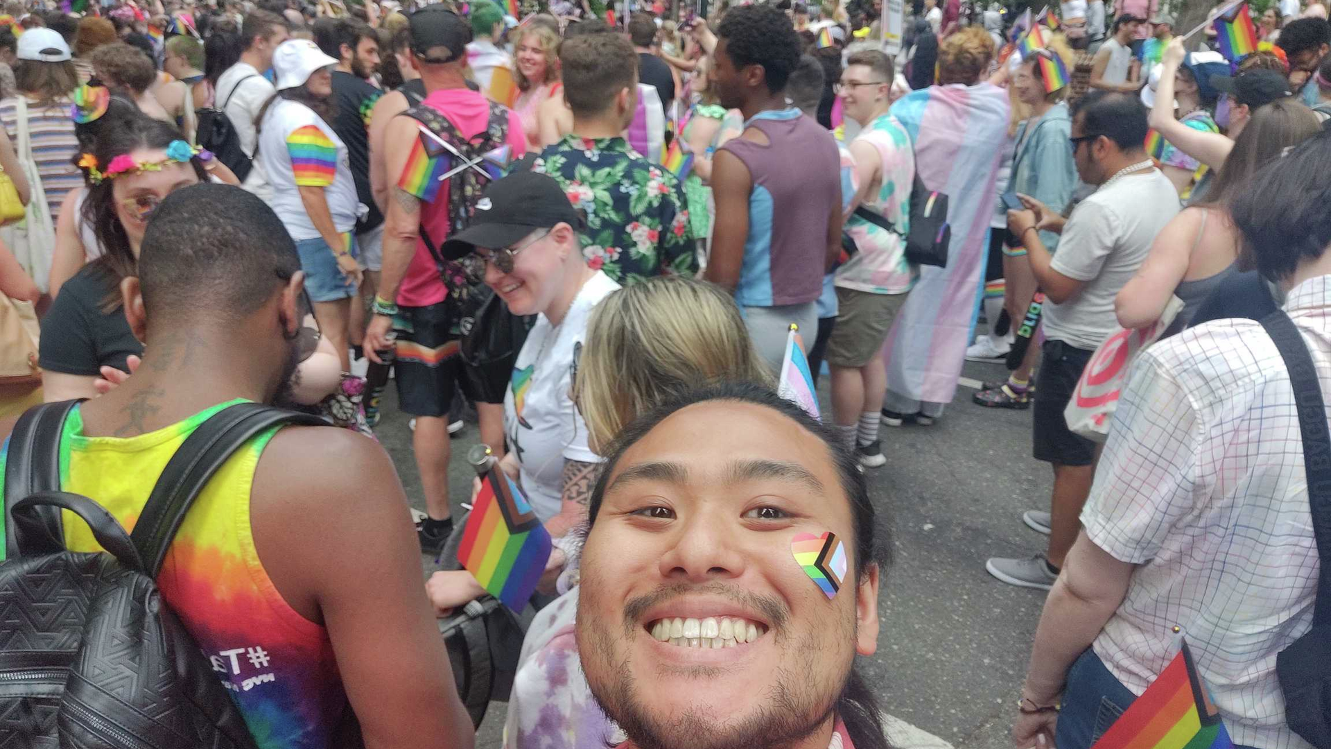 Selfie photo of Donald Duong while marching in Philly Pride parade