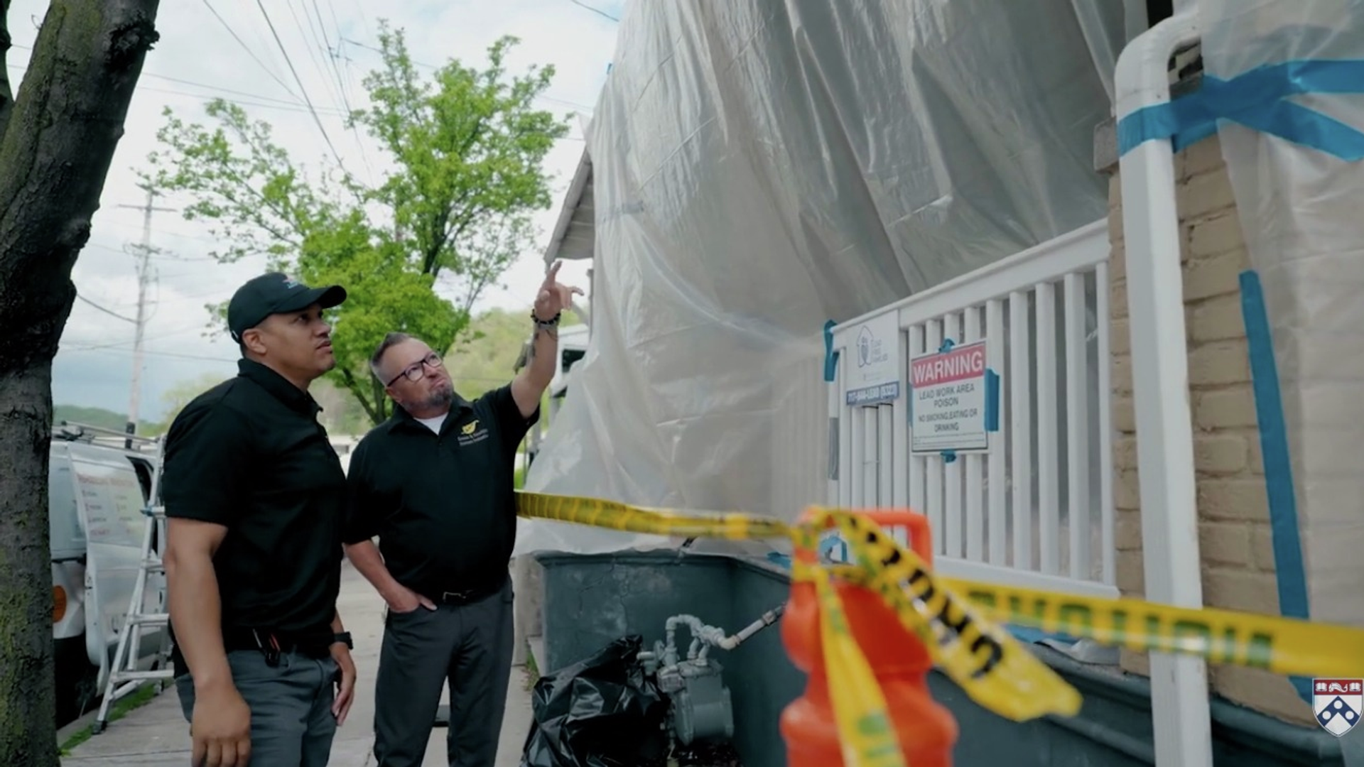 Members of the Green & Healthy home team inspect the home, which is under construction