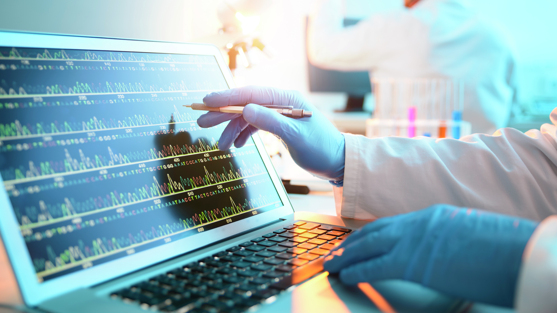 A scientist looking at a DNA sequence