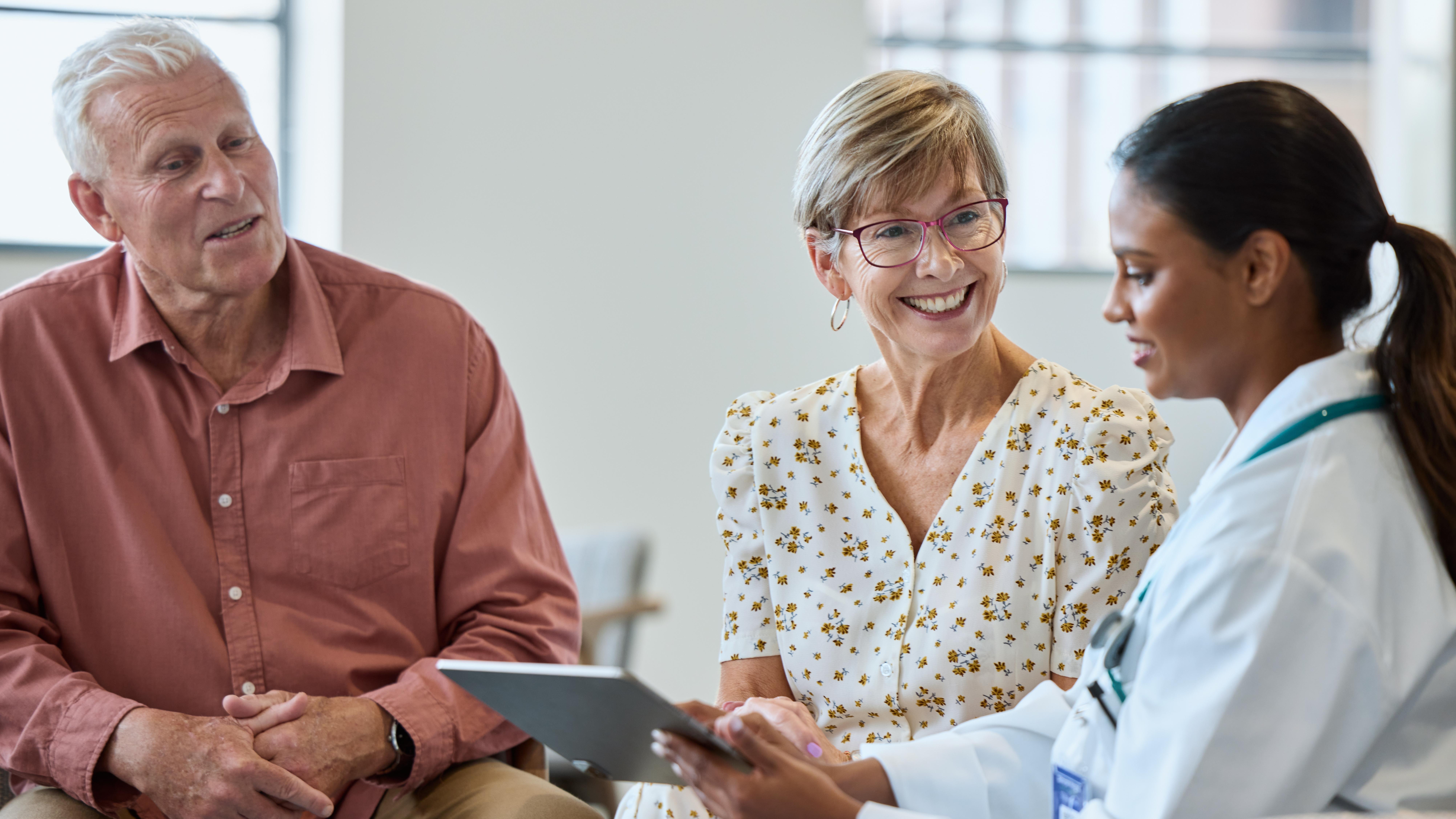 Elderly patients are discussing with healthcare expert