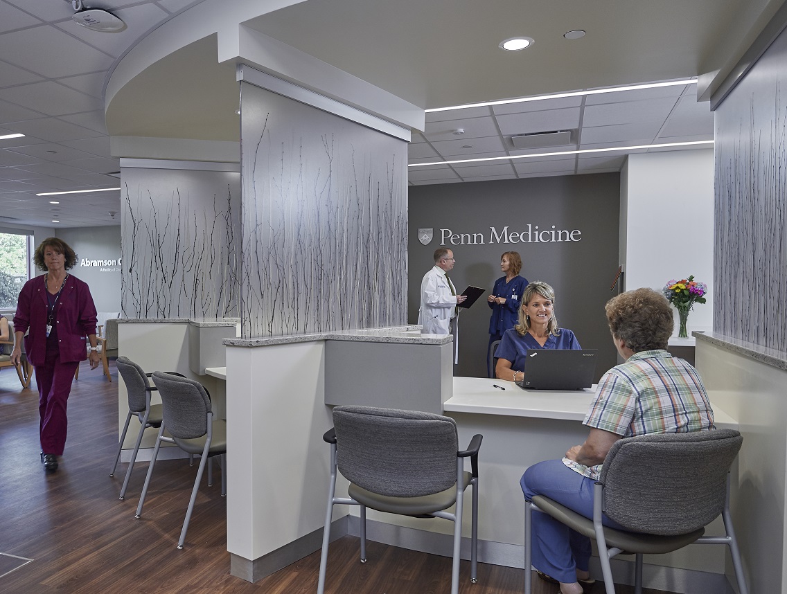 Elderly patient checking in at a Chester County Hospital Abramson Cancer Center location