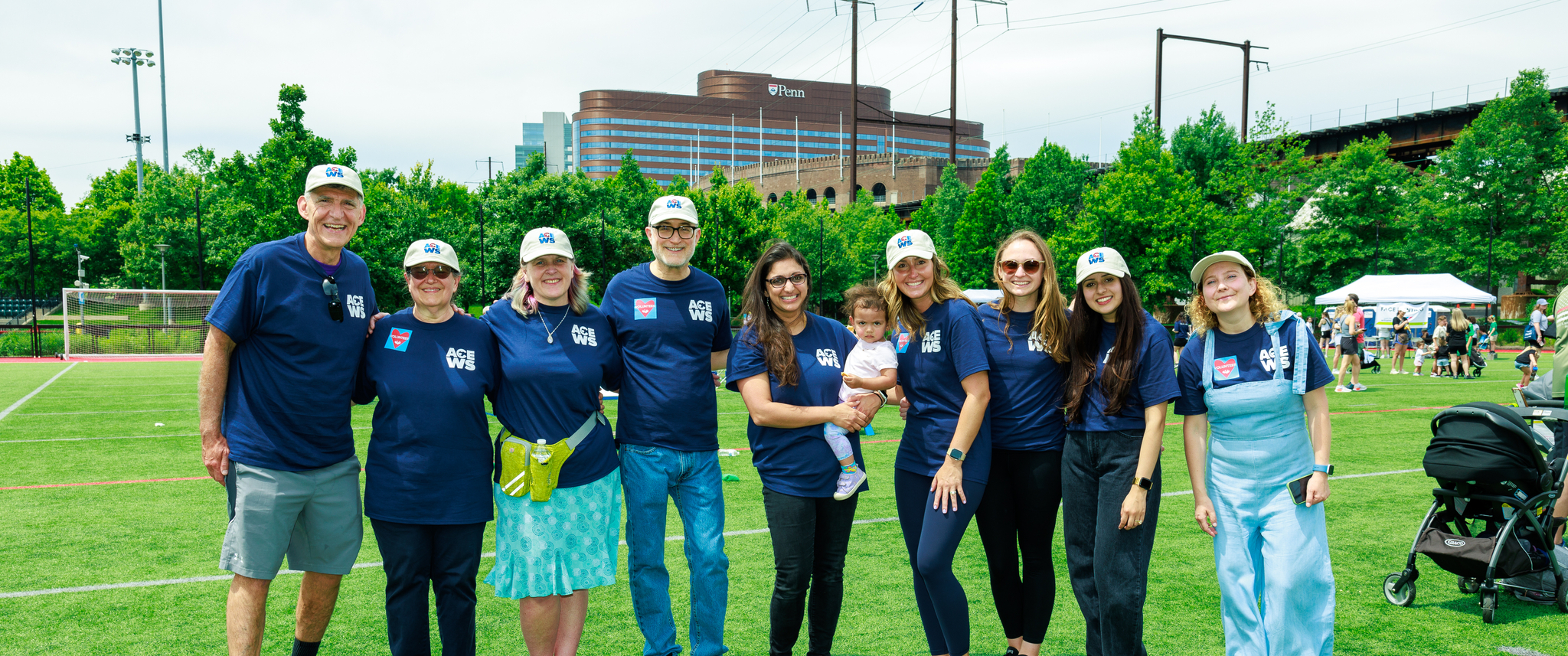 Daniel Rader with a group of Armellino Center for Excellence staff in Penn Park