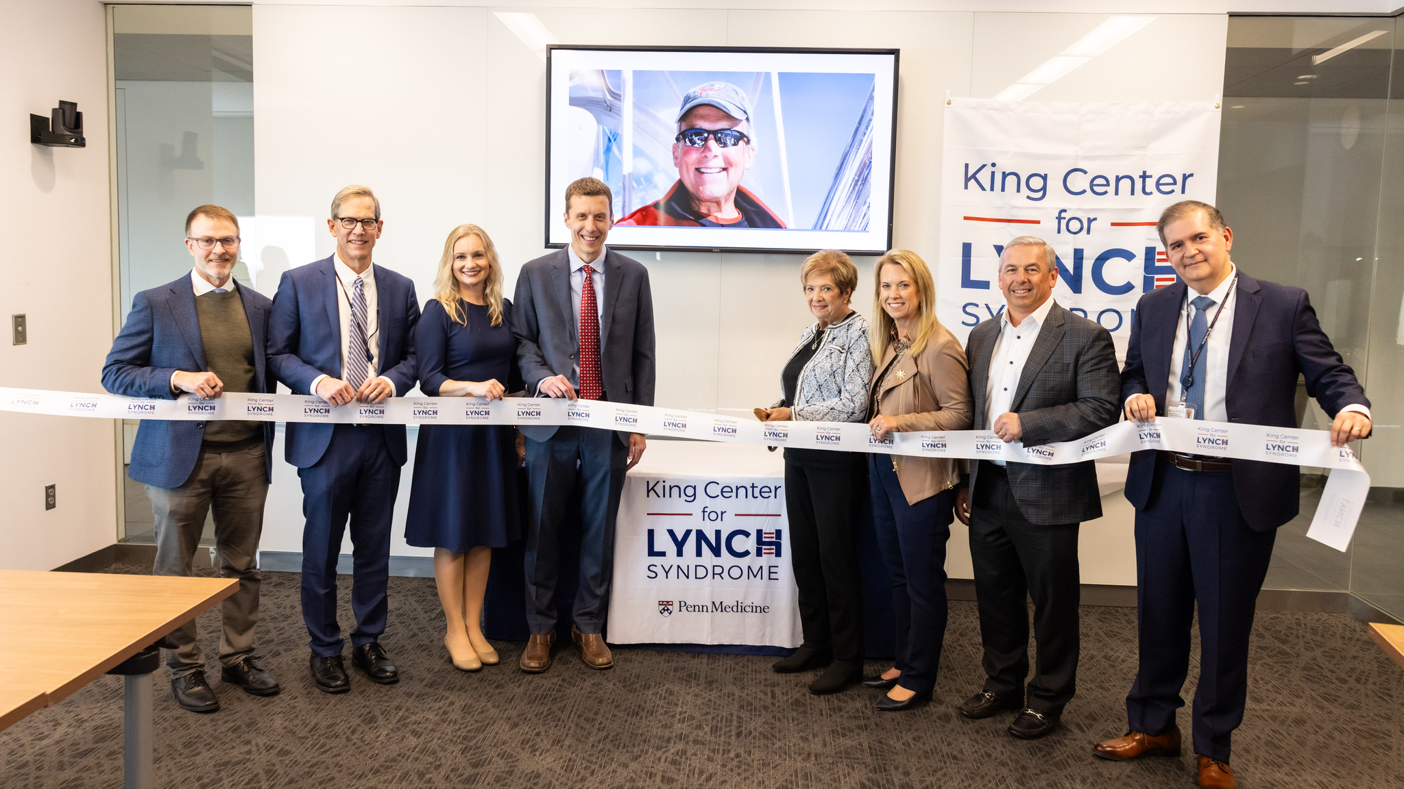 A ribbon-cutting ceremony of the King Center for Lynch Syndrome, attended by the center’s leadership team and members of the King and Borrelli families