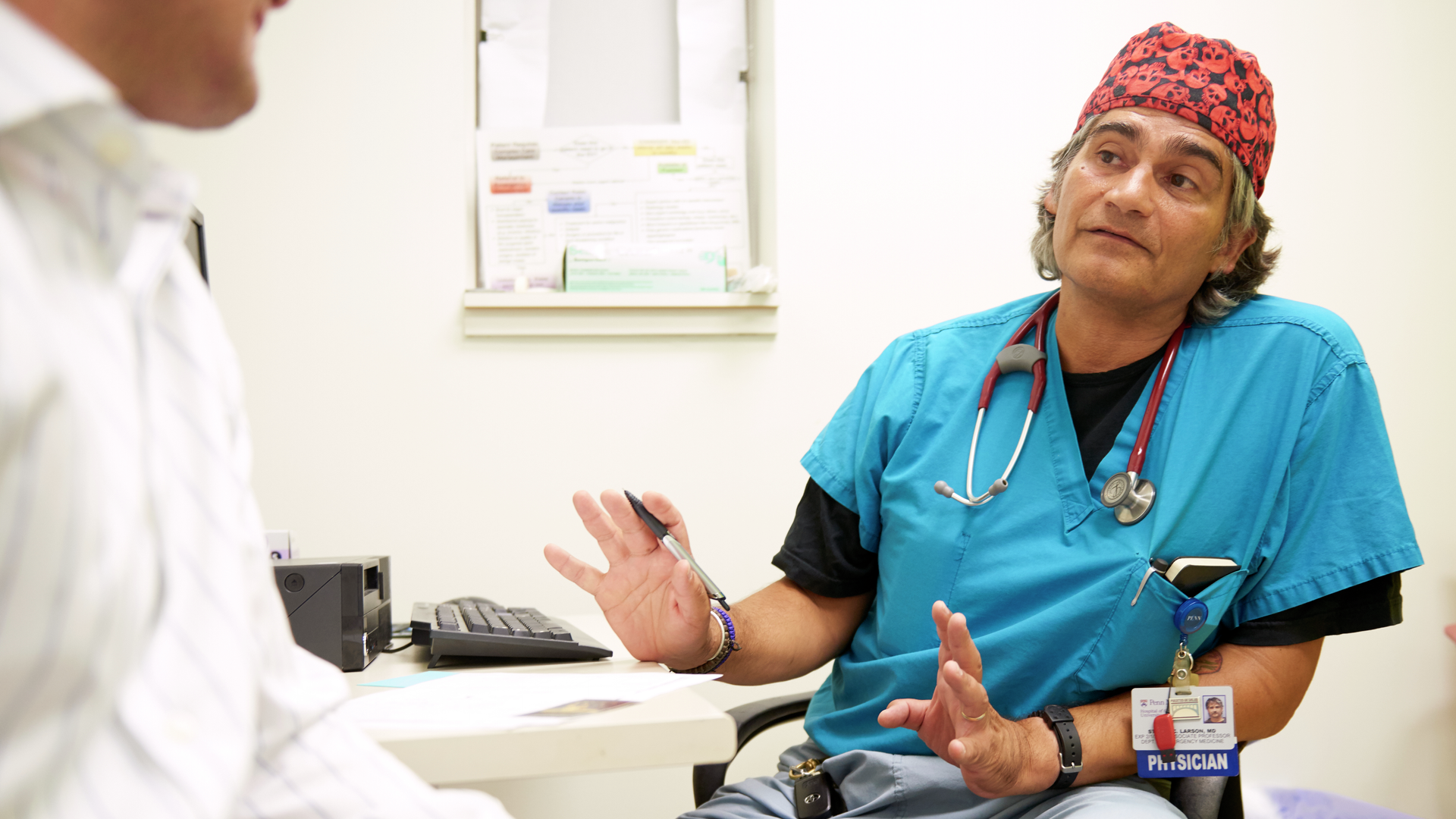 Steve Larson, MD, seated in a relaxed position