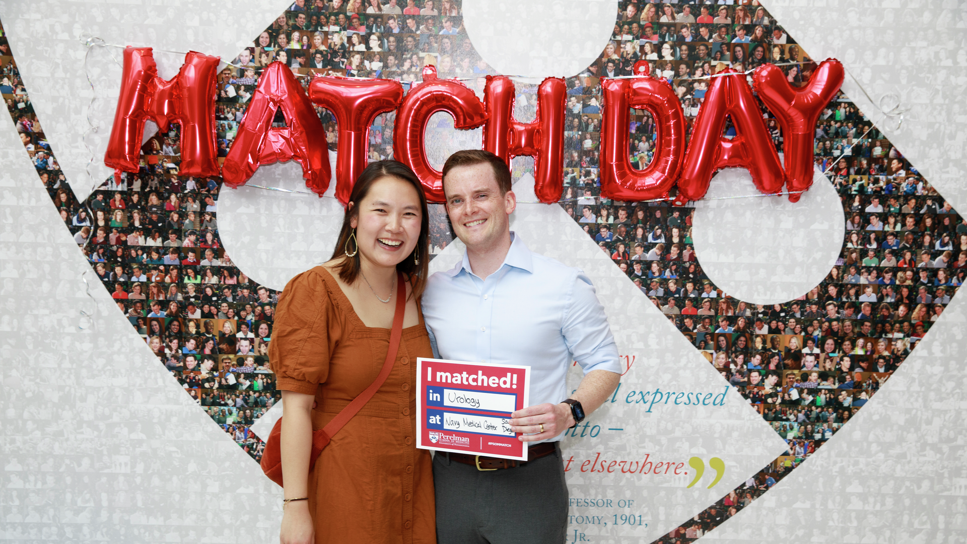  Nate McLauchlan holding a poster with his residency match next to his wife Megan Andre