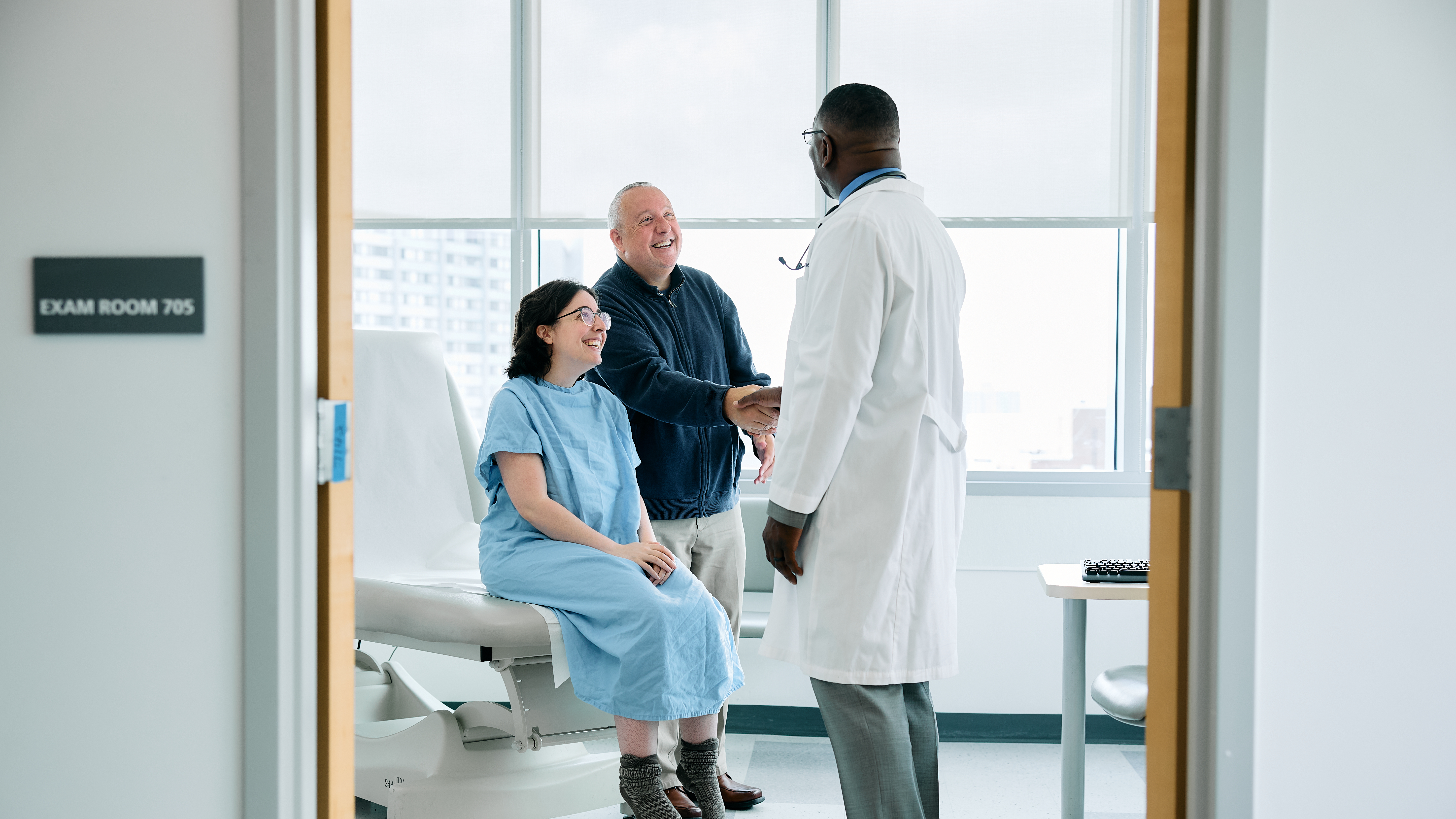 Doctor shaking hands with patients family member