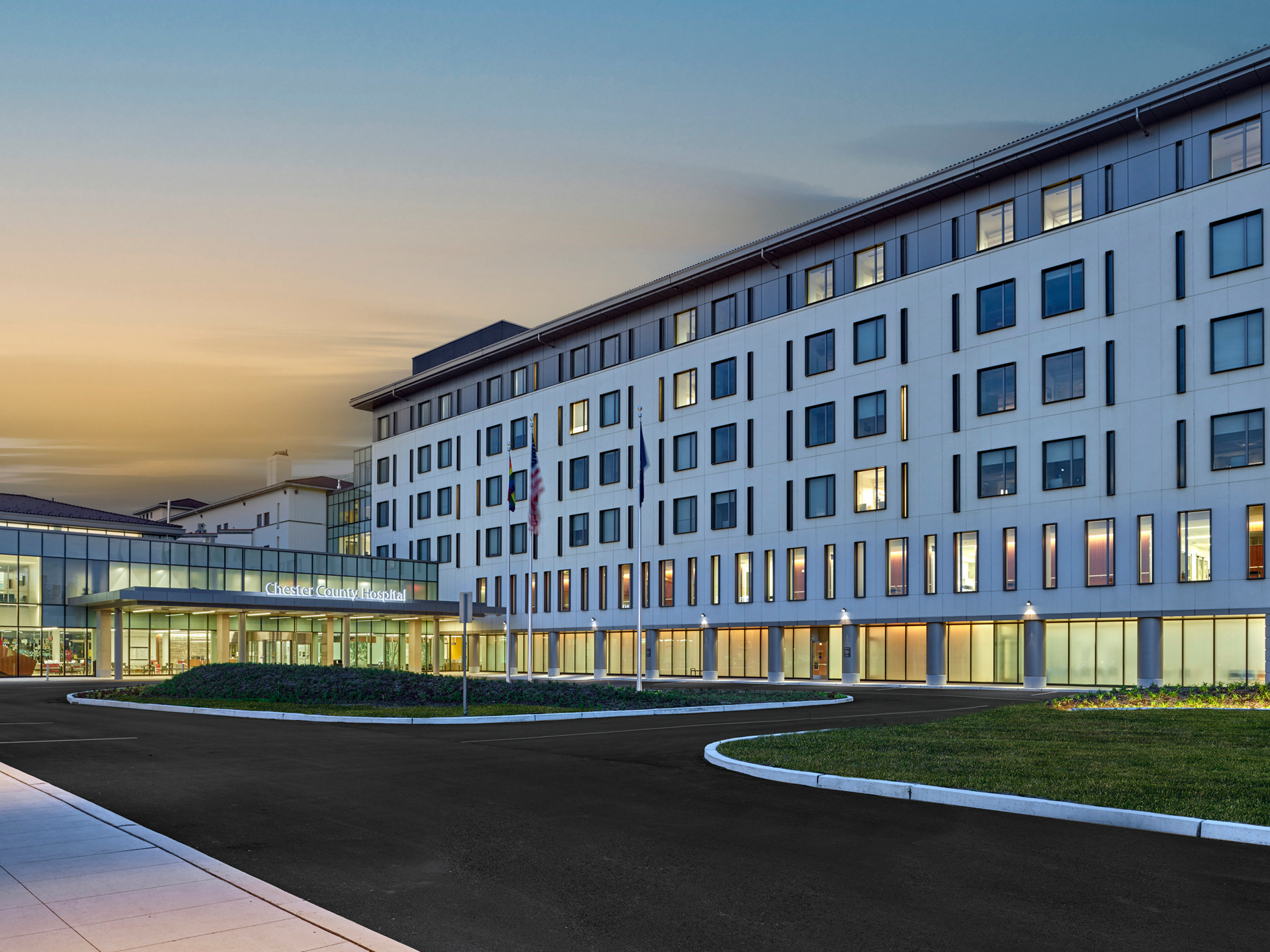 New exterior of the Chester County Hospital (CCH) building at sunset