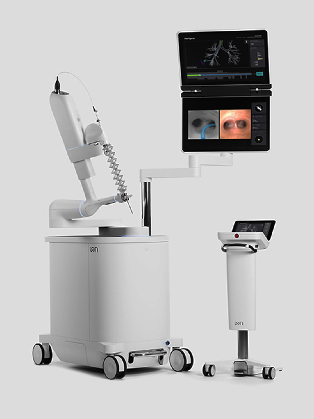 The Ion bronchoscopy system console, catheter, and imaging screen are shown