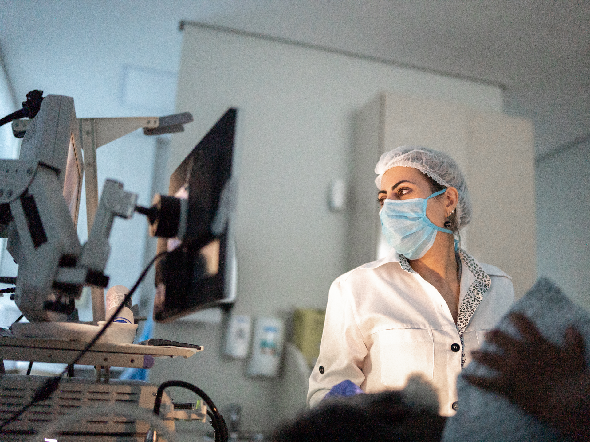 Doctor examining patient with endoscope