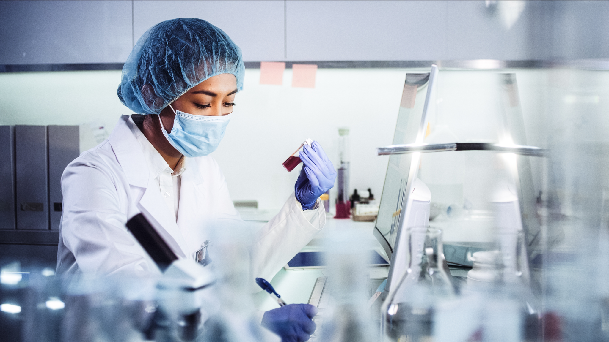 Asian female doctor working with pathogen samples