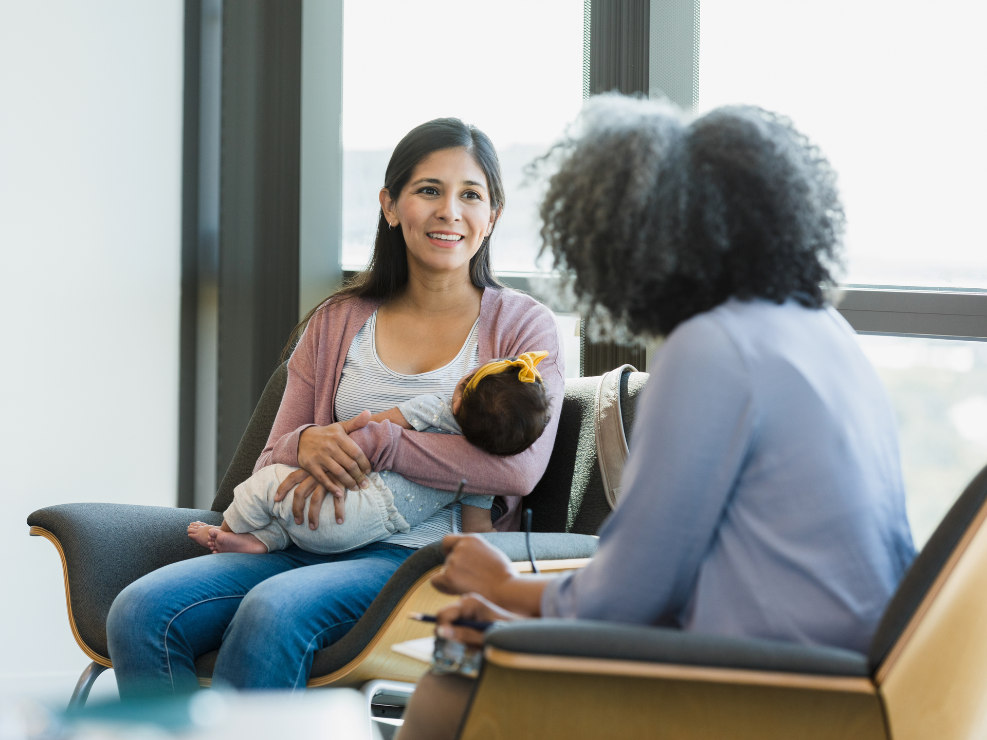 Therapist shares advice, new mother smiles
