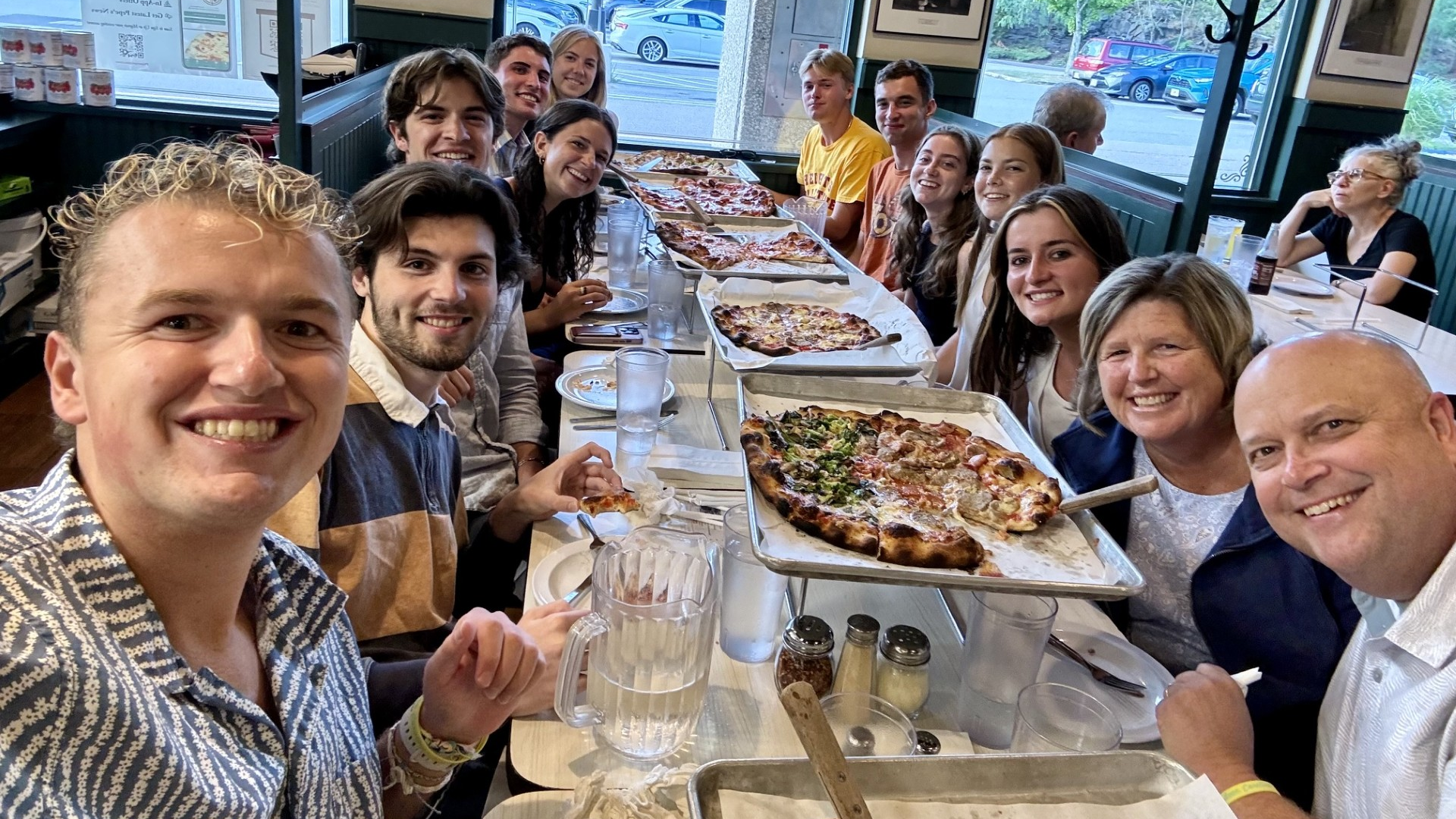 Kevin Comerford and his family and friends sitting around a dinner table