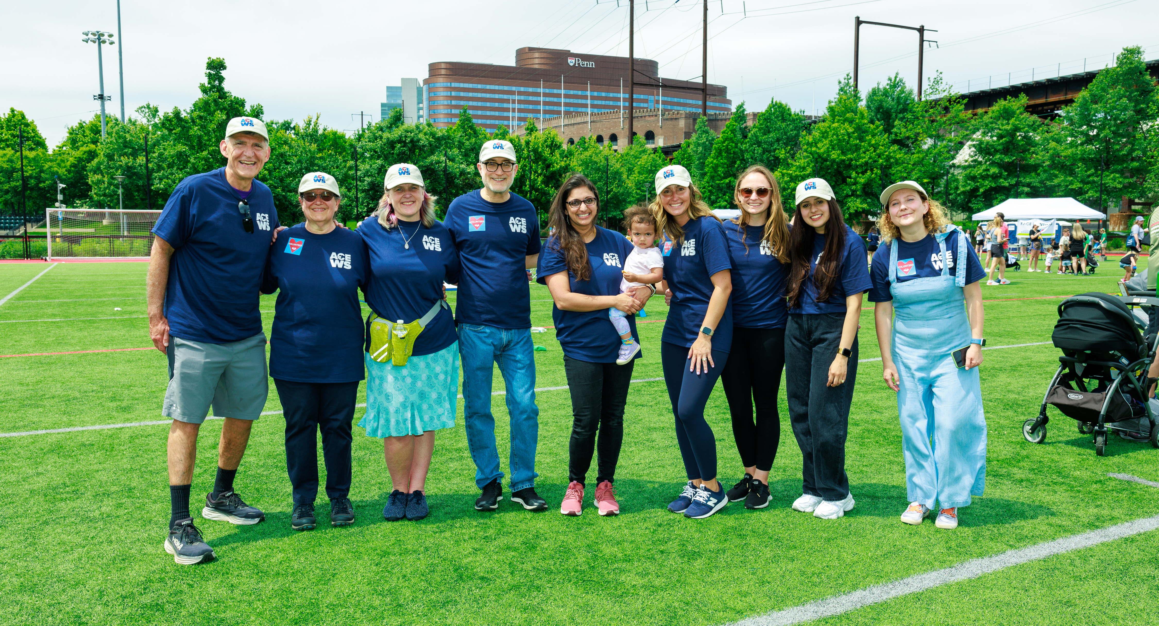 Daniel Rader with a group of Armellino Center for Excellence staff in Penn Park