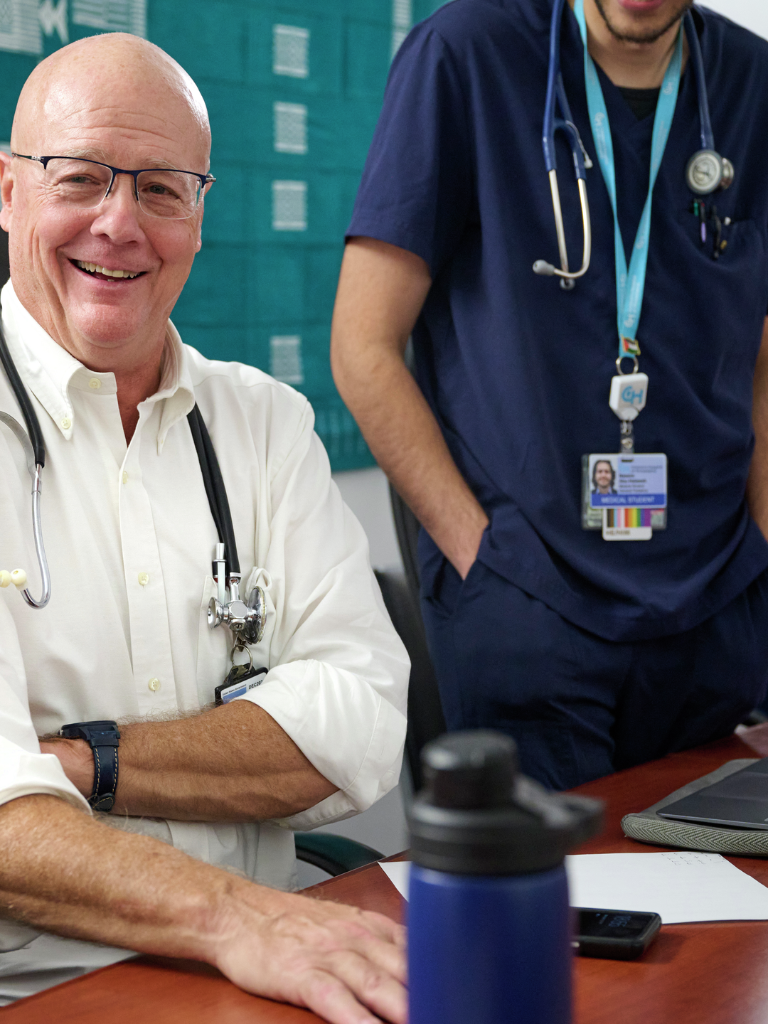 Michael Beers, MD, smiling at the African Health Clinic