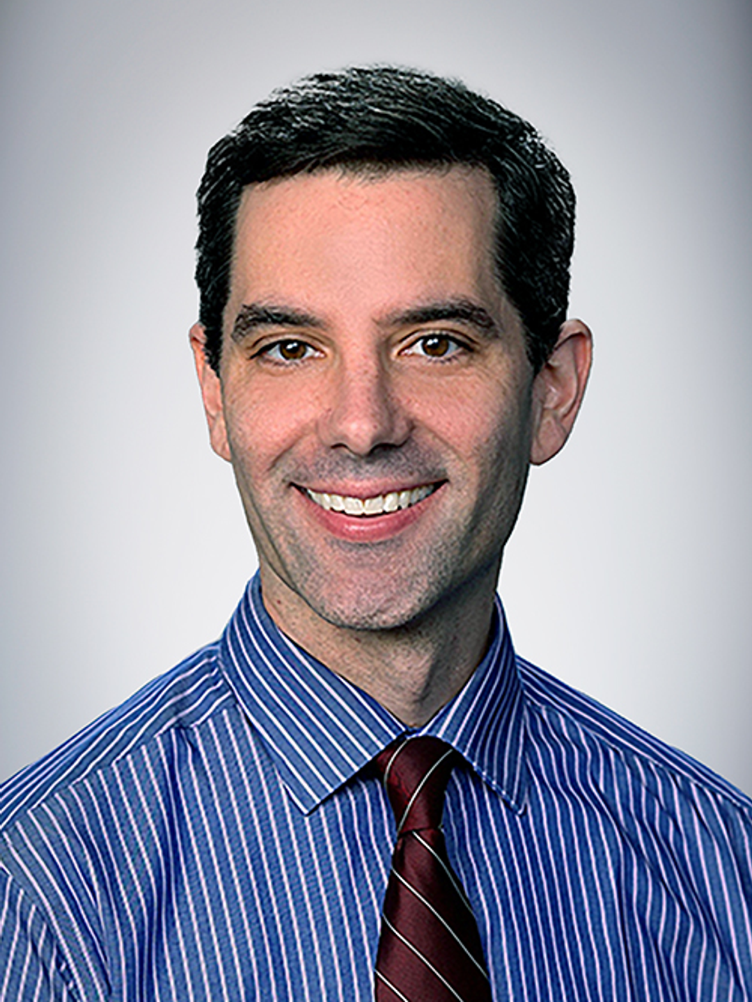 Headshot of David M. Merrick, MD, PhD