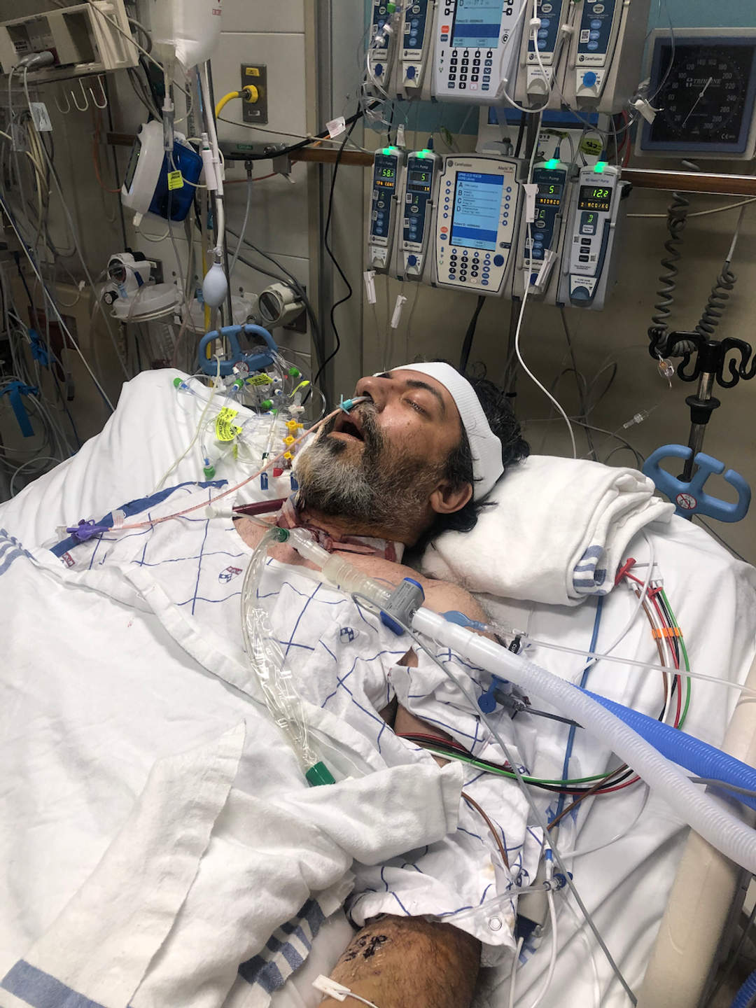 Fred Rahmanian sick in a hospital bed