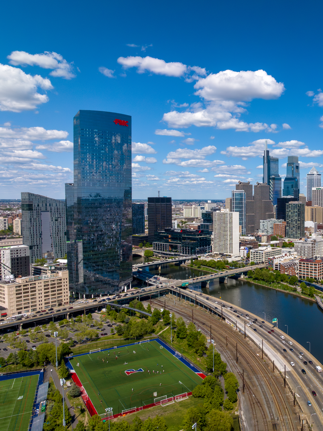 The Philadelphia city skyline under a blue sky